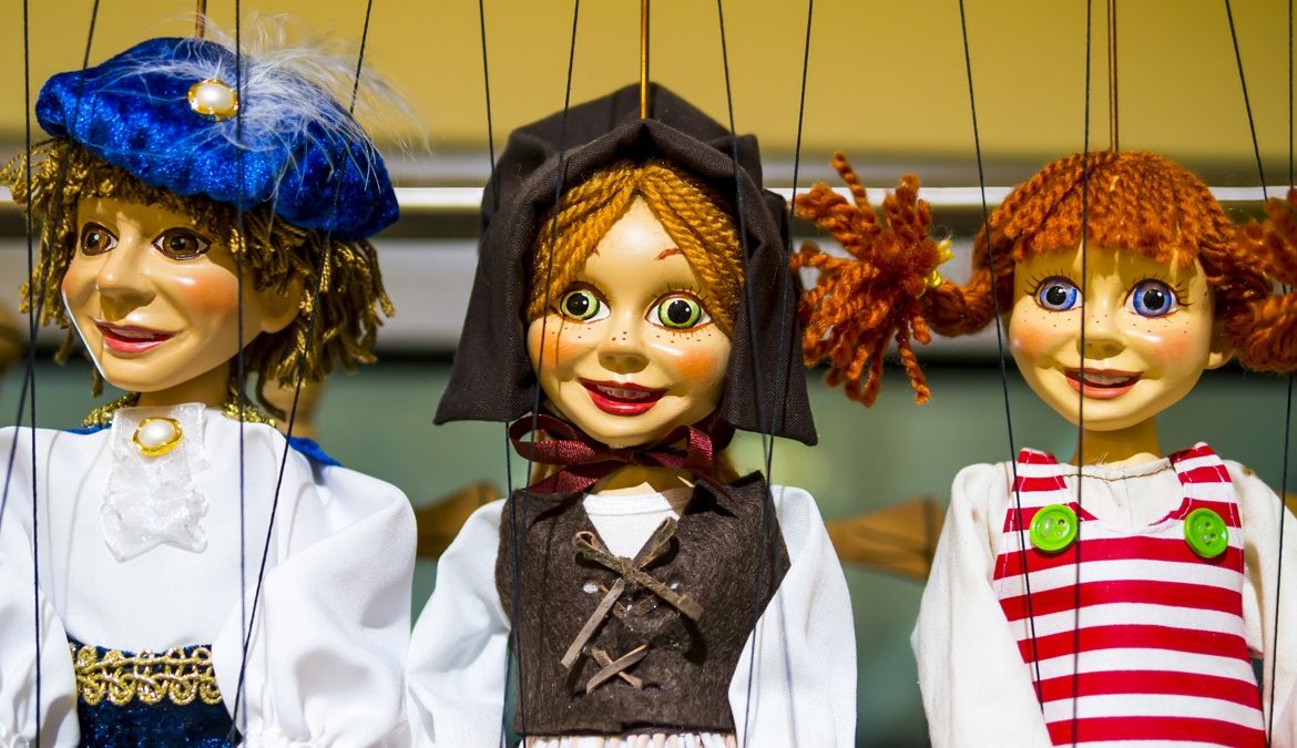 Row of traditional puppets