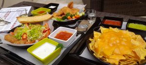 Nachos with guacamole and tomato sauce in Panorama Hotel Prague